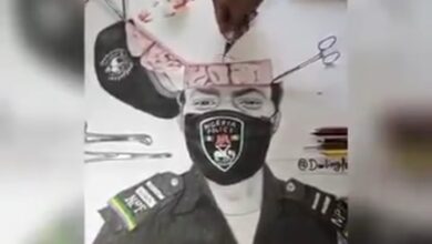 #EndSARS Protest: Artist Performs Artistic Brain Surgery on Police Officer [Video]